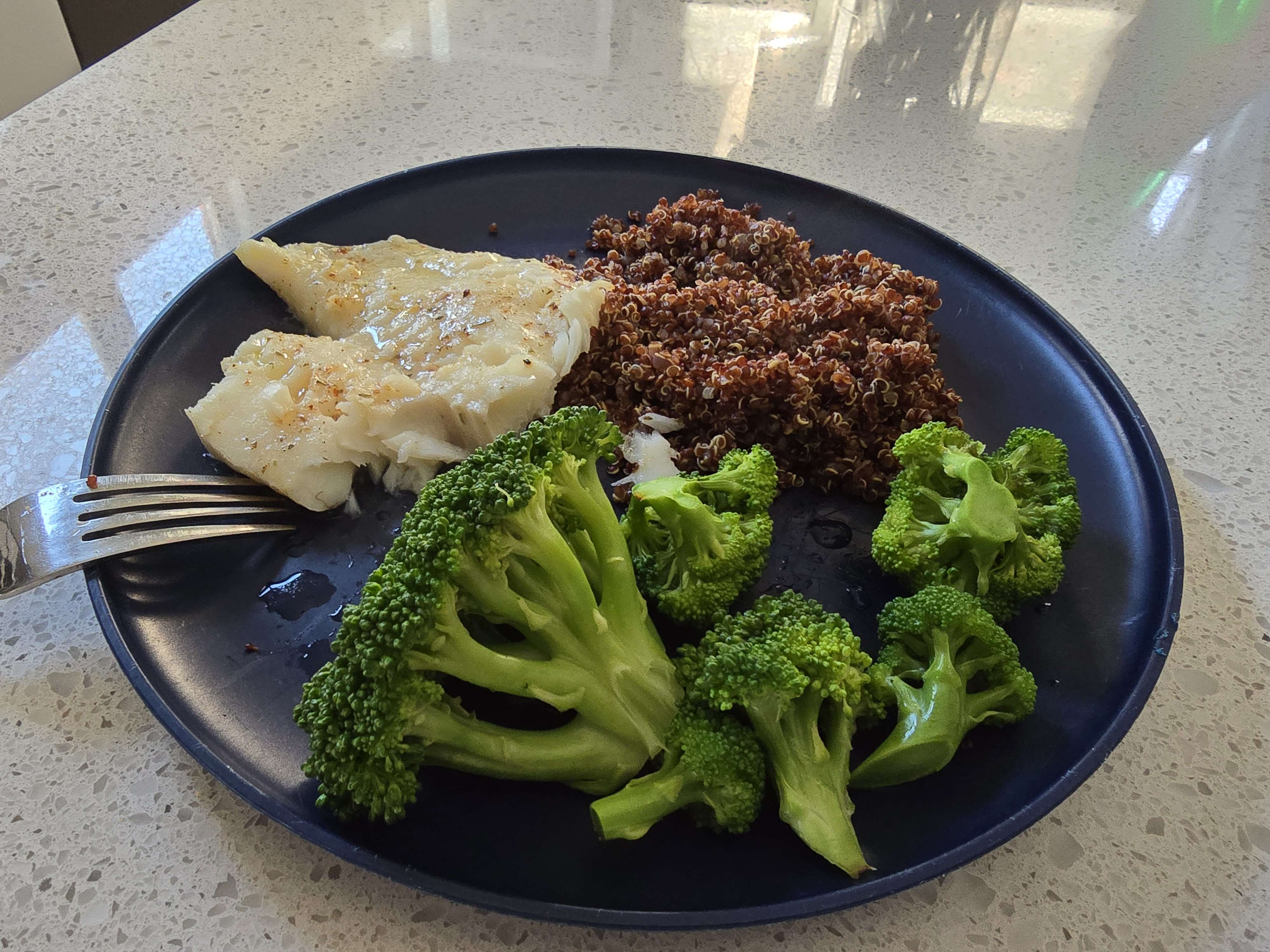 Baked fish quinoa broccoli