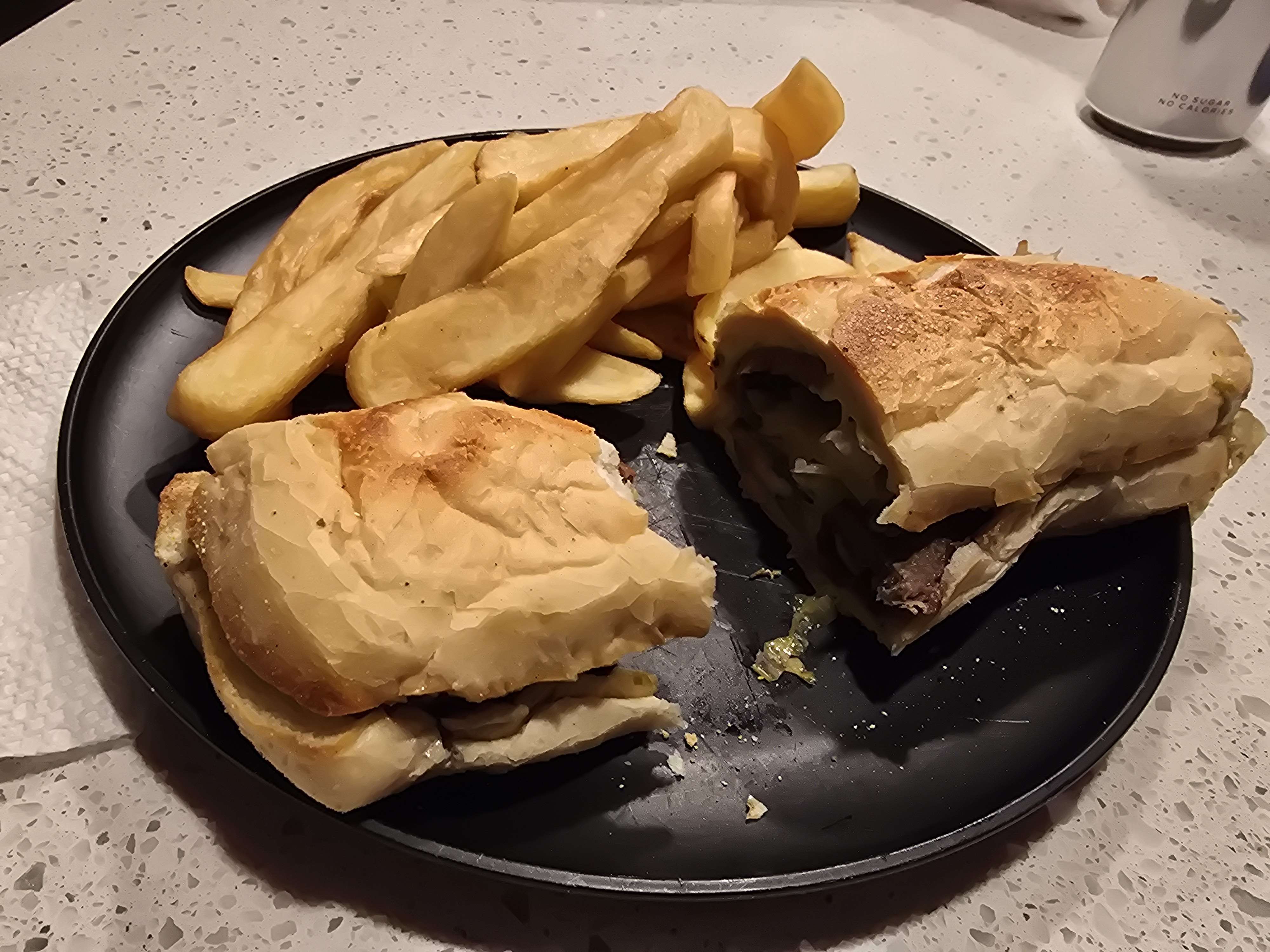 steak sandwich and fries