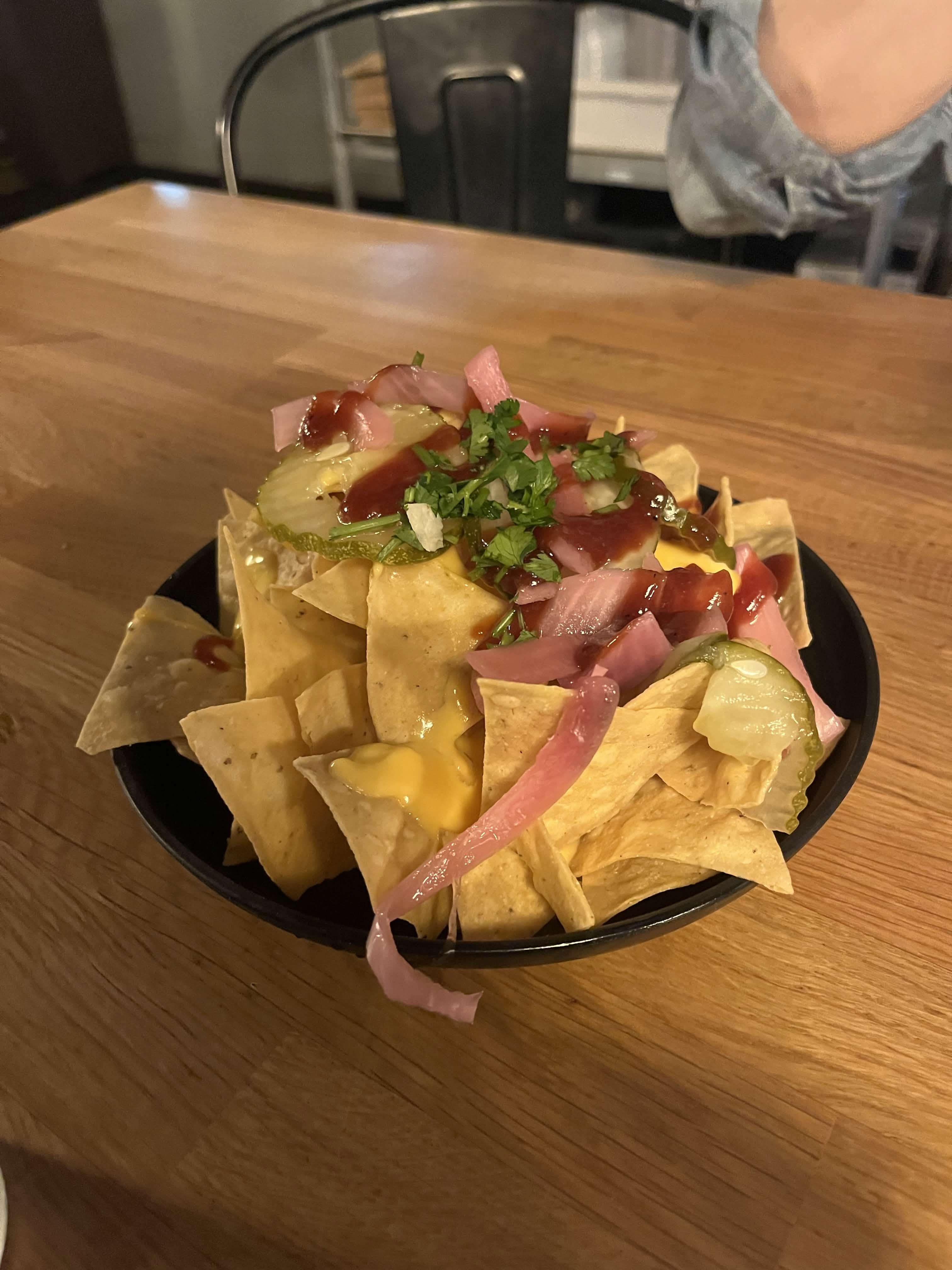 Also went to some bbq place and a little after we sat down the guy dropped this off at our table but the place was loud we couldn’t hear him and I had to motion him to say “I didn’t order this” and I guess it’s complimentary nachos