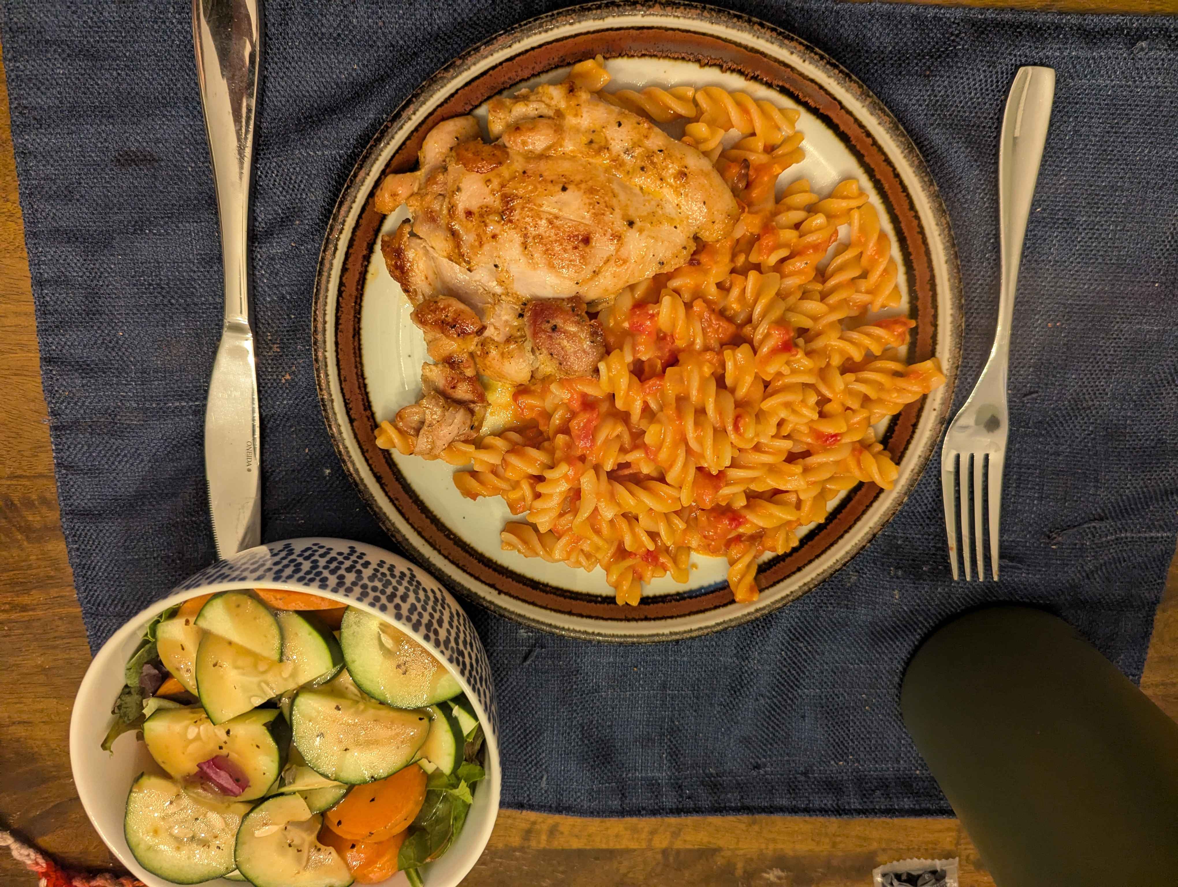 Chicken with pasta and salad