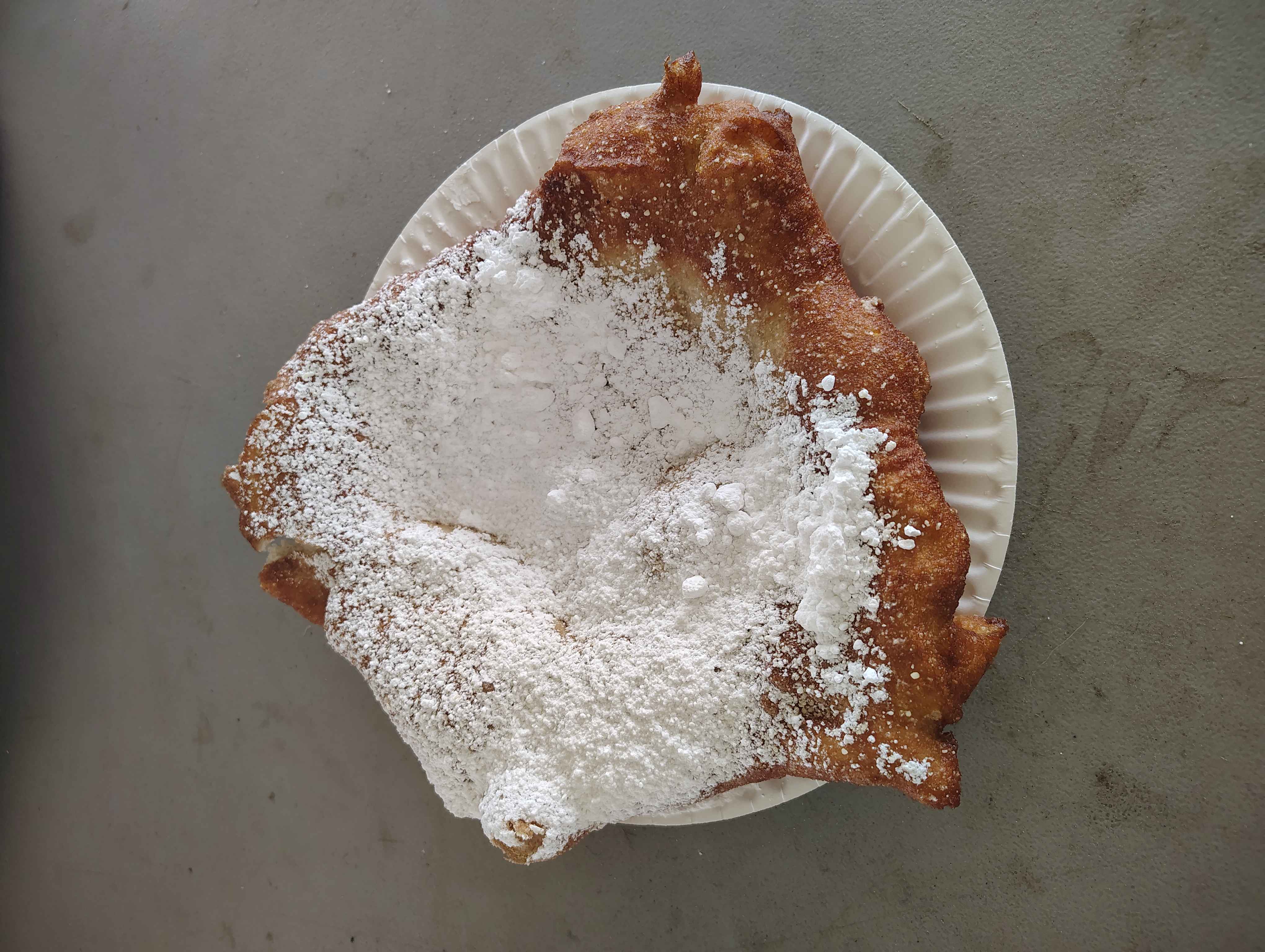 Fried dough with powdered sugar