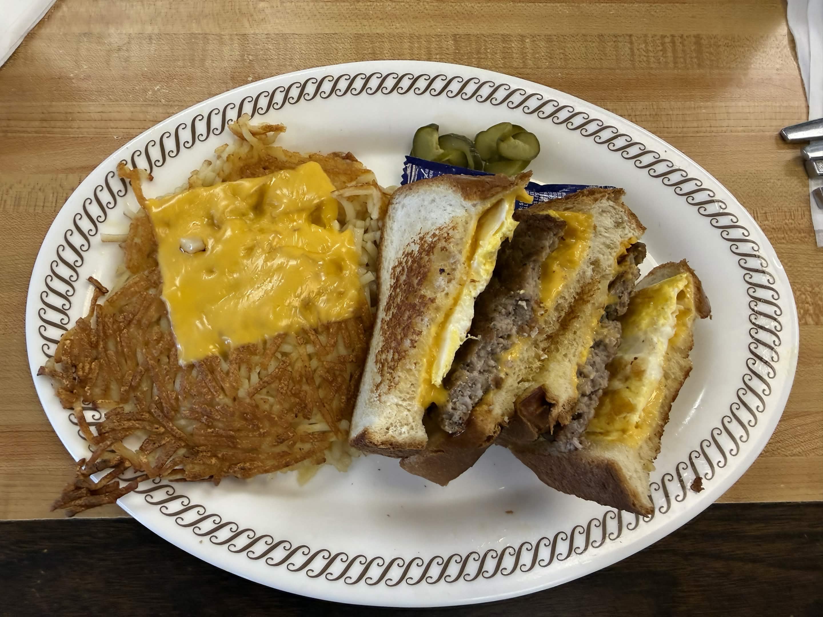 Cheeseburger sandwich with hash browns