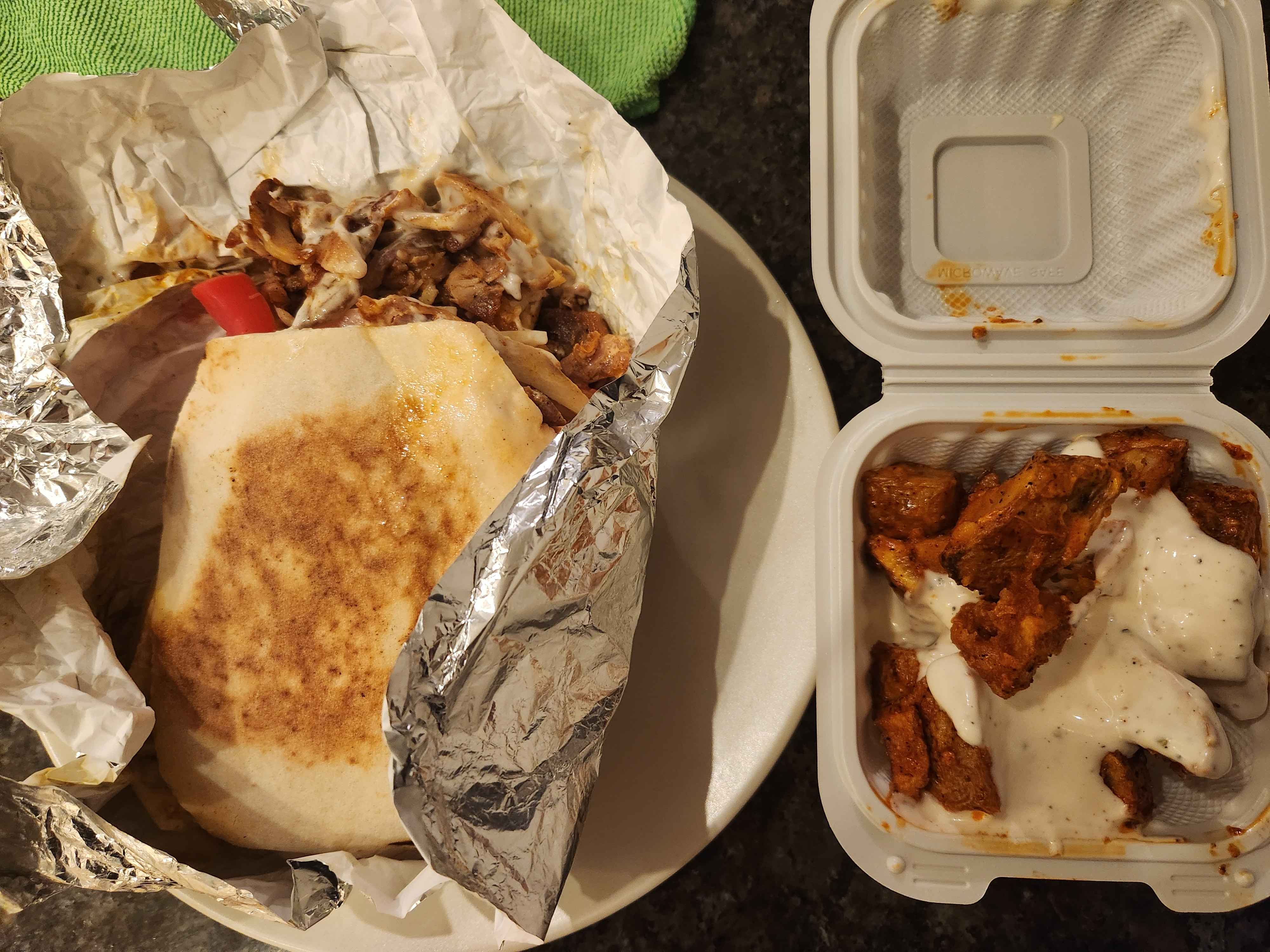 Wrap with meat and vegetables, seasoned potatoes with white sauce.