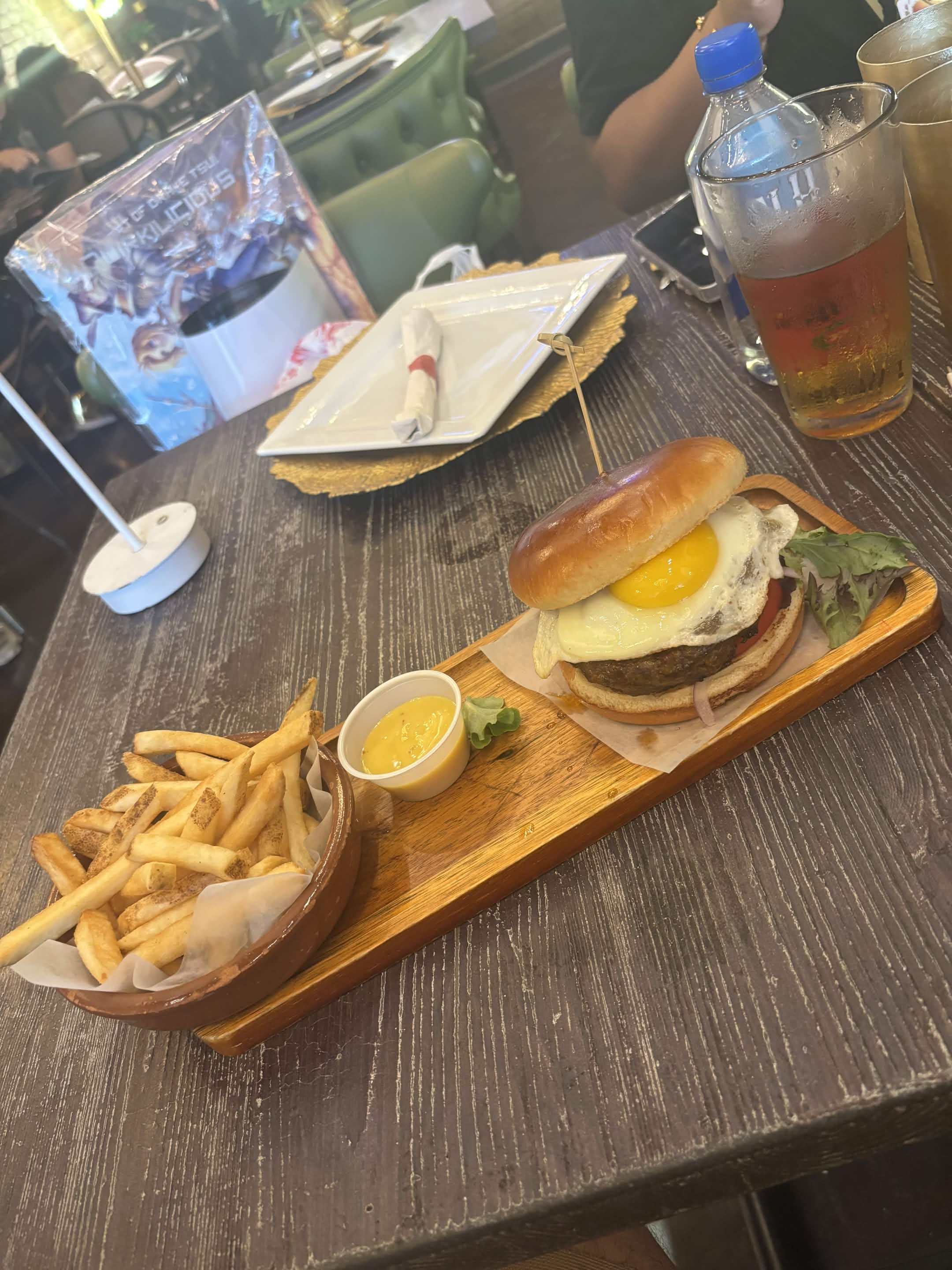 Fried egg burger with fries