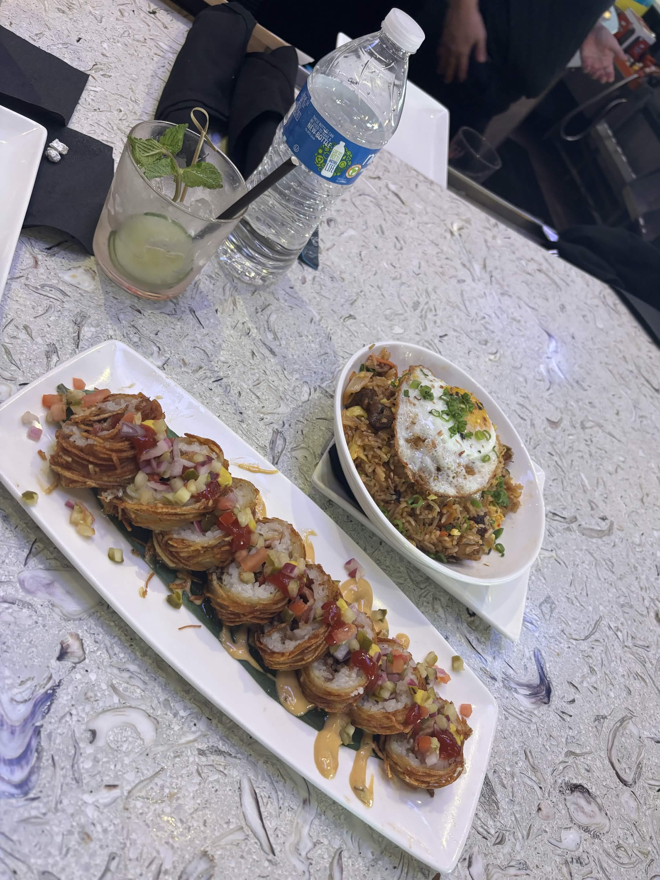 Sushi rolls, fried rice egg