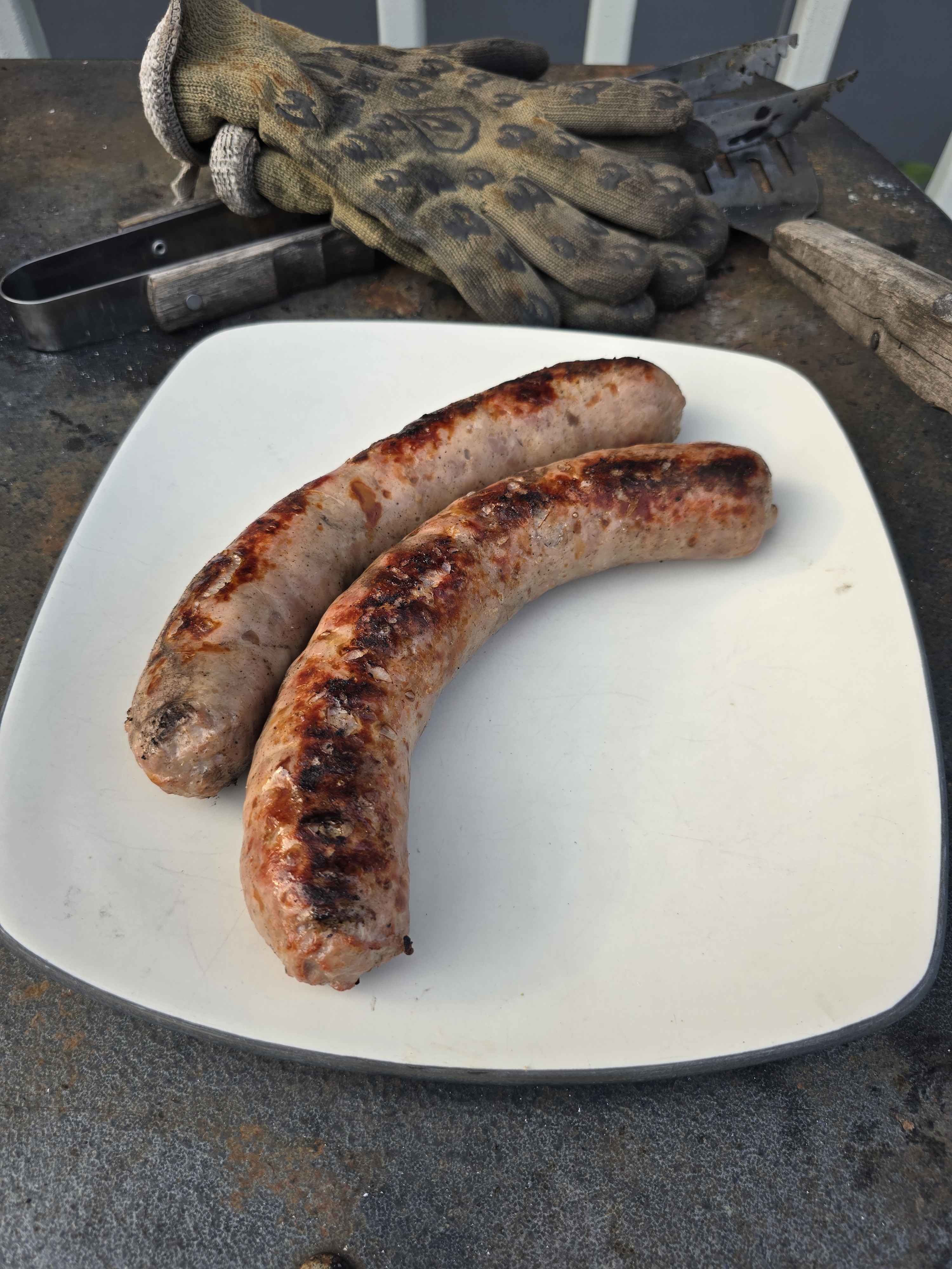 Grilled sausages on plate