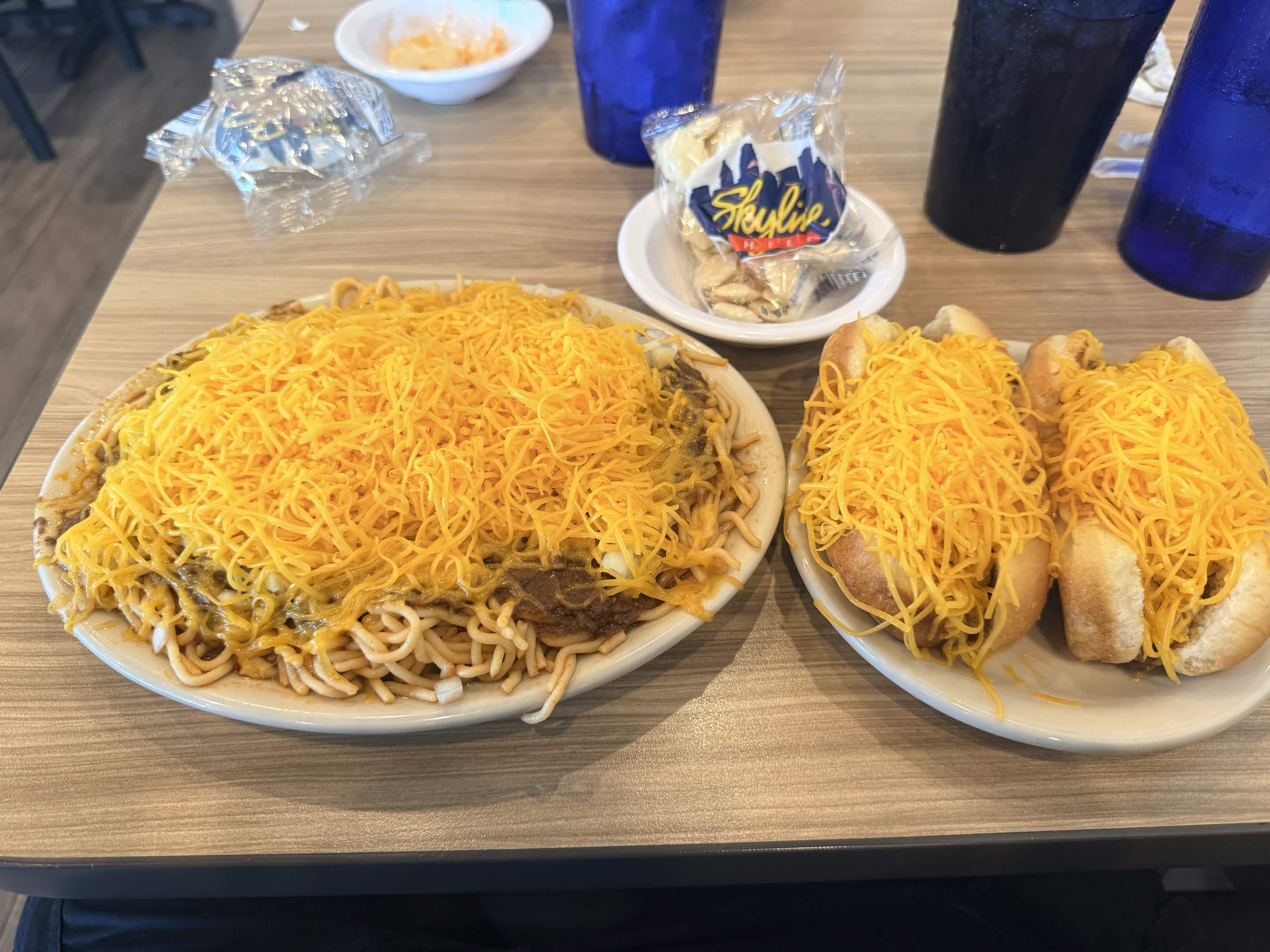 Chili spaghetti and cheese coneys