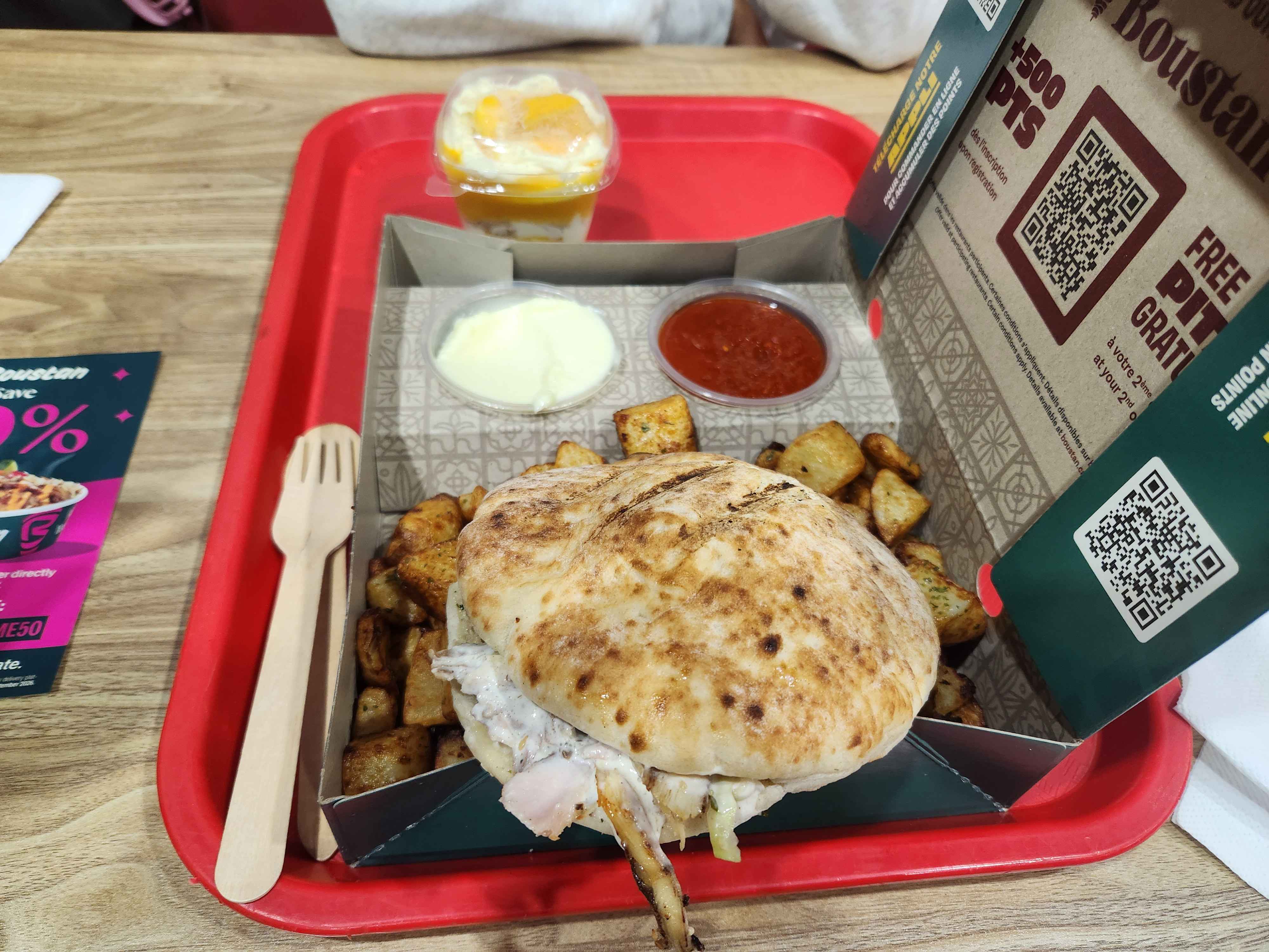 Chicken sandwich with potatoes