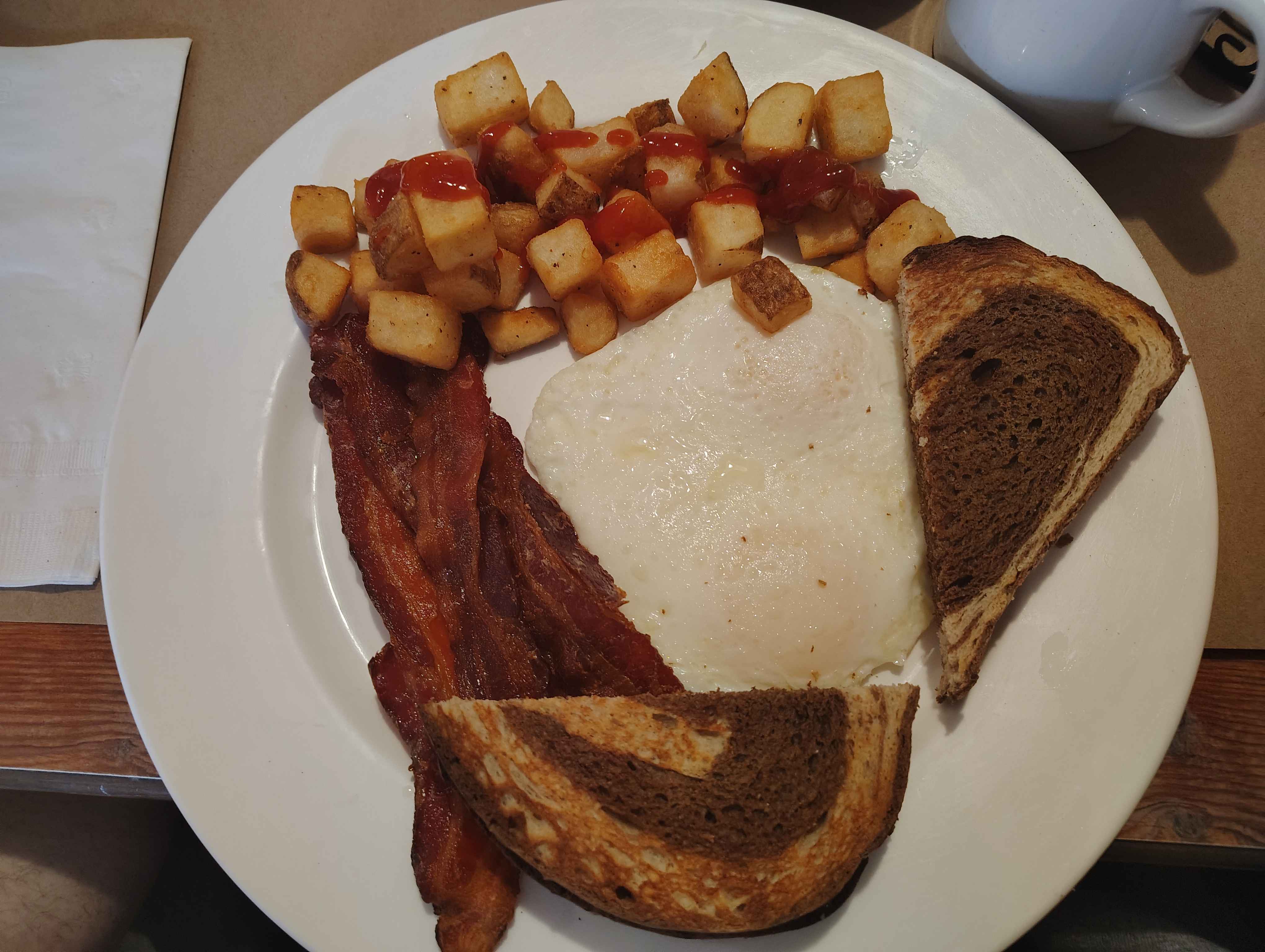 Eggs bacon toast potatoes