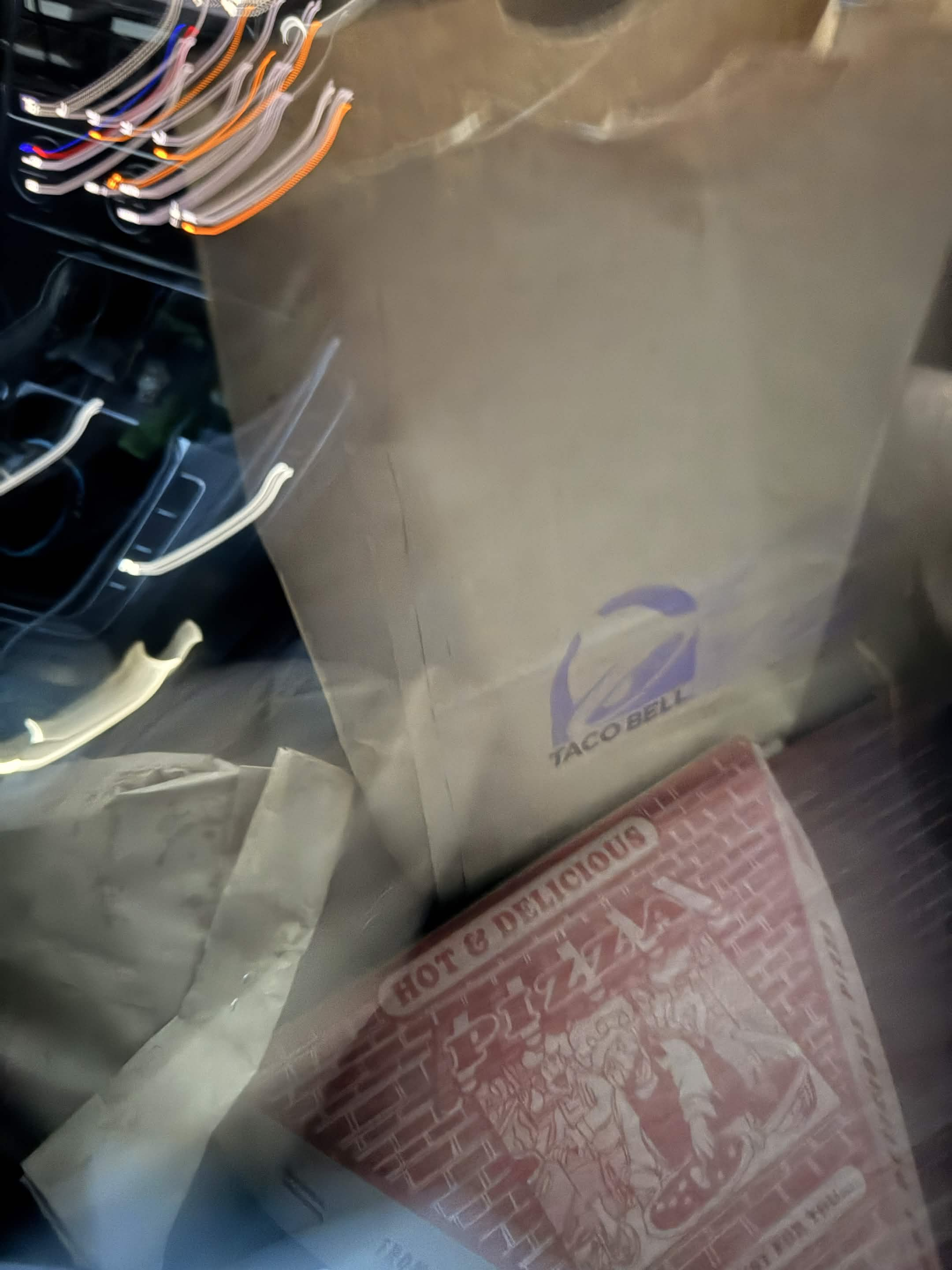 Taco Bell bag and pizza box