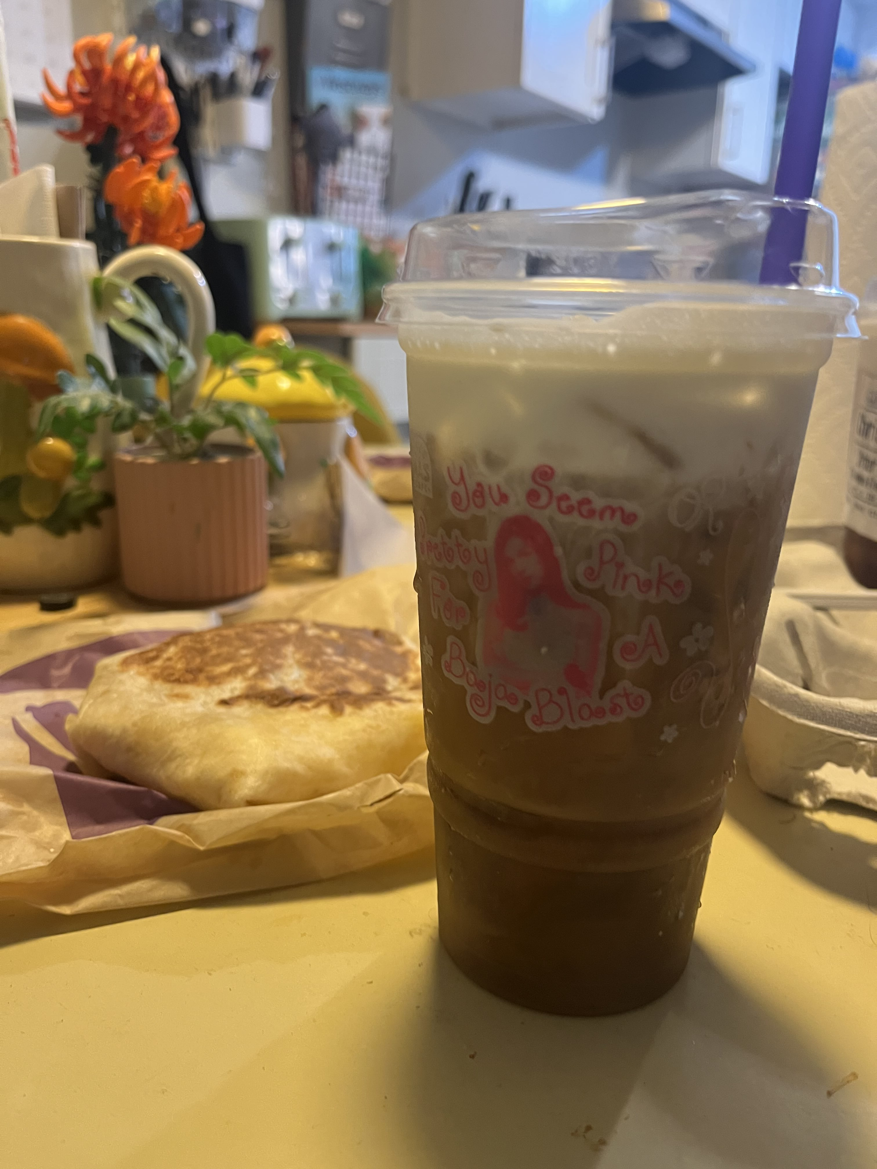 Fast food wrap and iced coffee