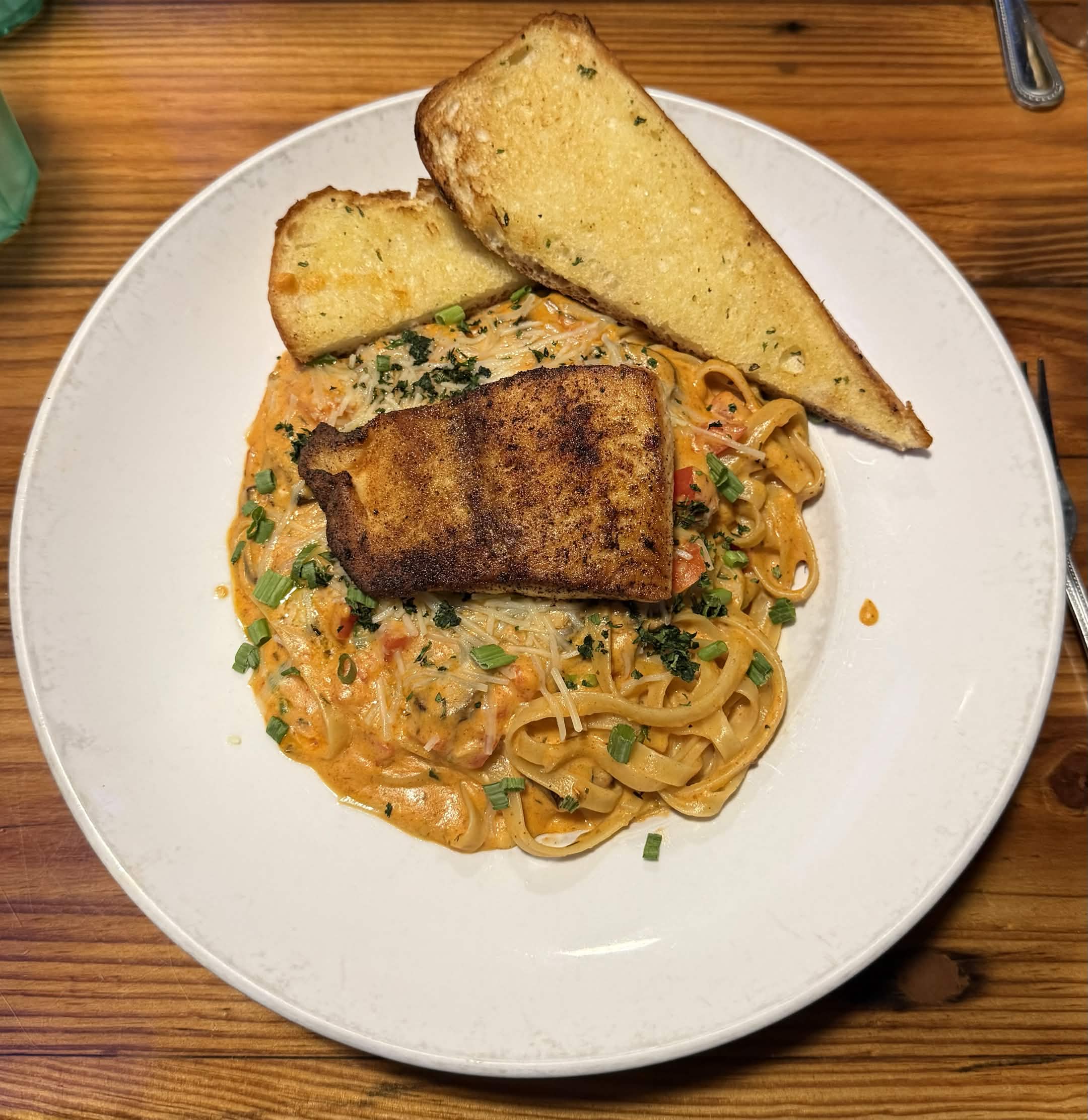 Blackened salmon with creamy pasta